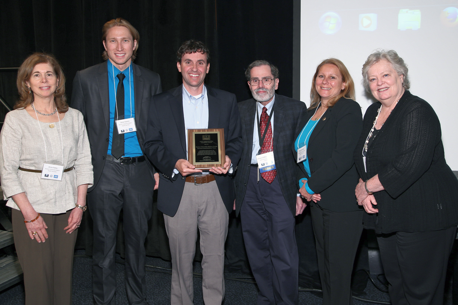 Boston University Student Health Services Immunization Team receiving their award from Alfred DeMaria, Jr, MD.